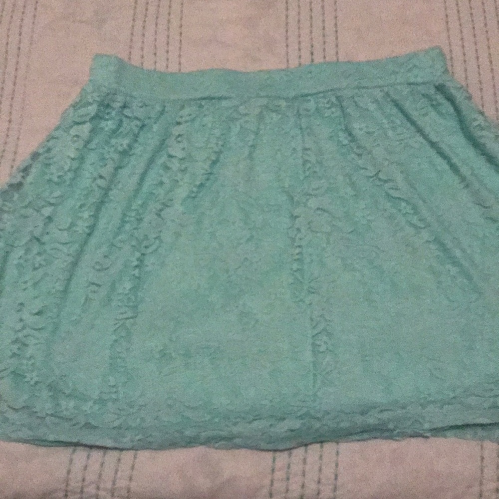 Elastic waist skirt. Lace over fabric.